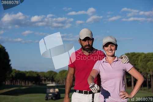 Image of portrait of couple on golf course