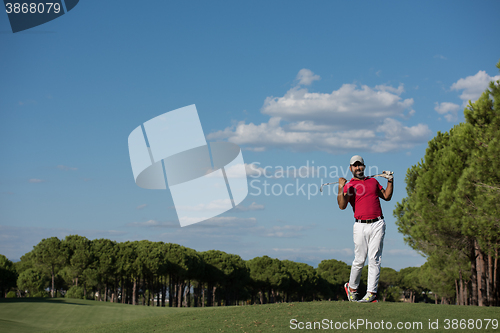 Image of golf player hitting long shot