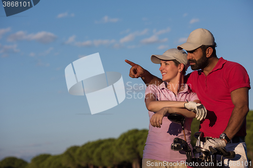 Image of portrait of couple on golf course