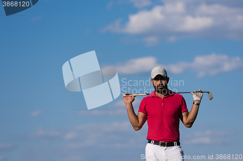 Image of handsome middle eastern golf player portrait at course