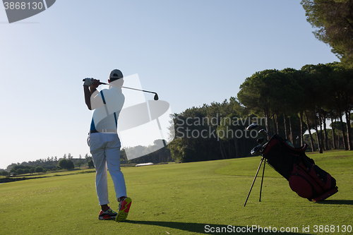 Image of golf player hitting shot