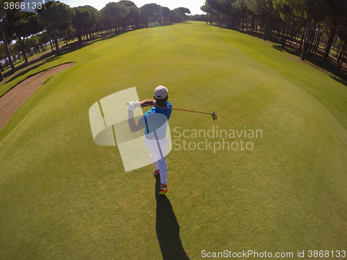 Image of top view of golf player hitting shot