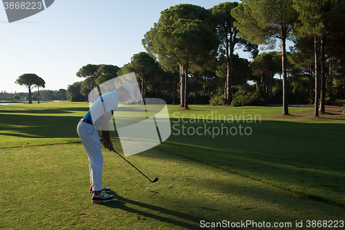 Image of golf player hitting shot