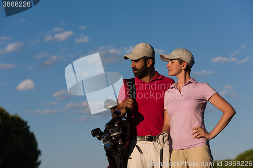 Image of portrait of couple on golf course