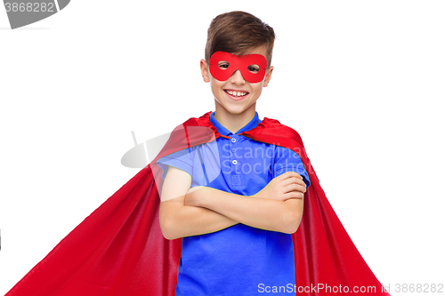 Image of boy in red super hero cape and mask