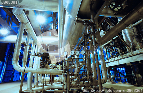 Image of Industrial zone, Steel pipelines, valves, cables and walkways