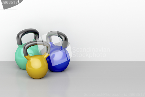 Image of Three kettlebells