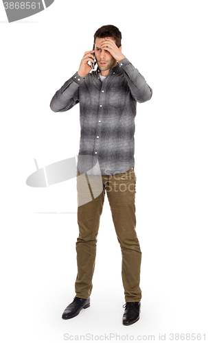 Image of Caucasian man on the phone - confusing phone call