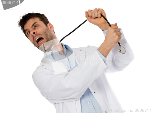 Image of Humorous portrait of a young depressed suicidal surgeon with a s