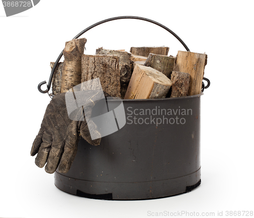 Image of Metal basket of firewood