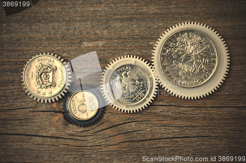 Image of Gears with coins inside