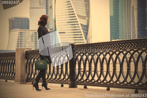 Image of woman in a dark coat