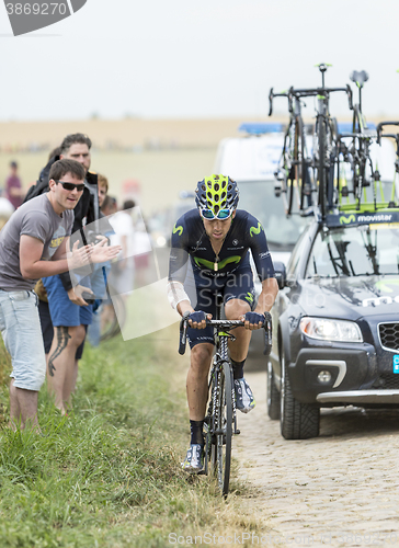 Image of Alex Dowsett Riding on a Cobblestone Road - Tour de France 2015