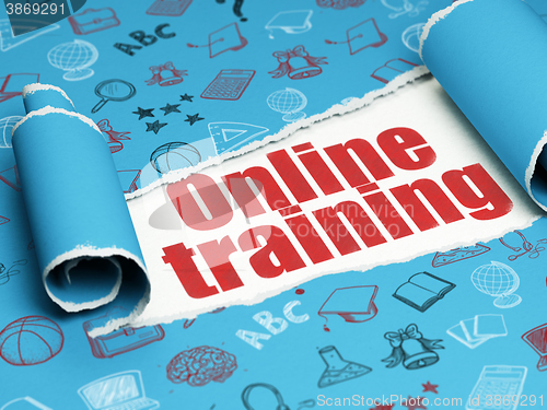 Image of Studying concept: red text Online Training under the piece of  torn paper