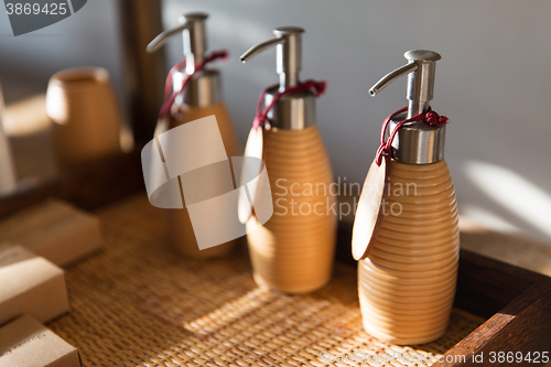 Image of close up of liquid soap or body lotion at bathroom