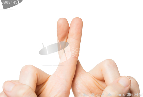 Image of close up of two hands putting fingers together