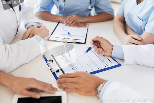 Image of close up of doctors with clipboards at hospital