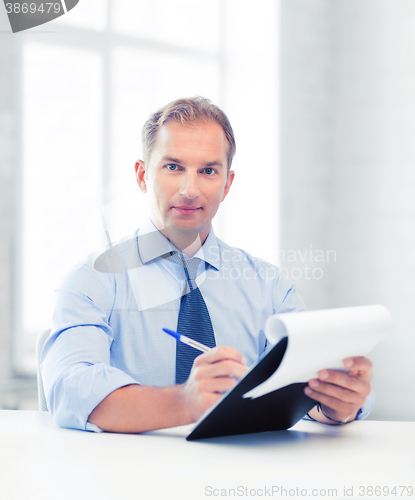 Image of businessman taking employment inteview