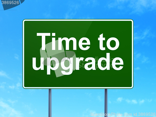 Image of Time concept: Time To Upgrade on road sign background