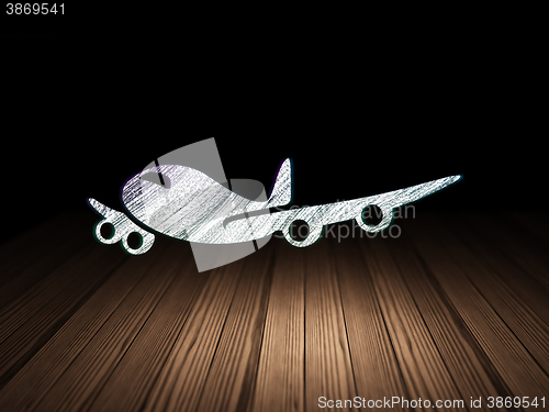 Image of Travel concept: Airplane in grunge dark room