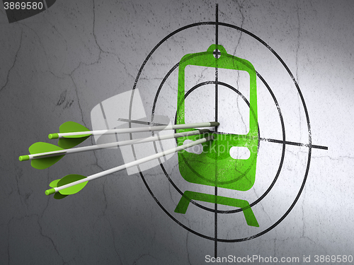 Image of Tourism concept: arrows in Train target on wall background