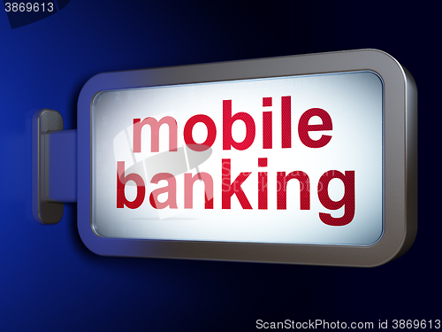 Image of Currency concept: Mobile Banking on billboard background