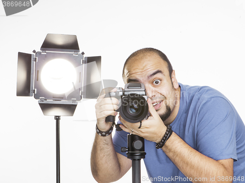 Image of professional photographer with photographic equipment