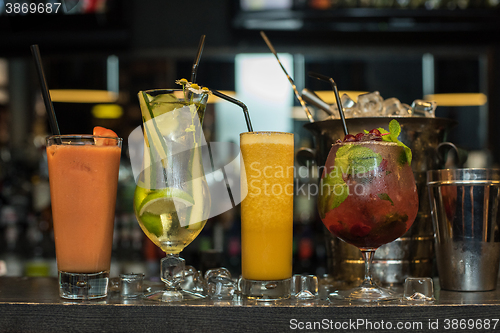 Image of cocktails on bar background