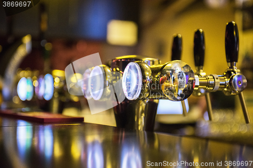 Image of Metallic beer taps