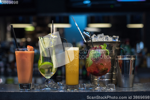 Image of cocktails on bar background
