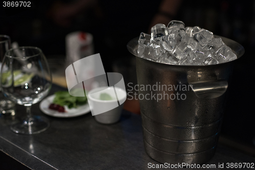 Image of Ice bucket with ice cubes