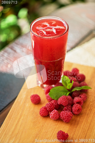 Image of fruit drink with raspberries