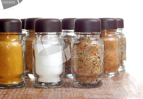 Image of variety of spices in bottles