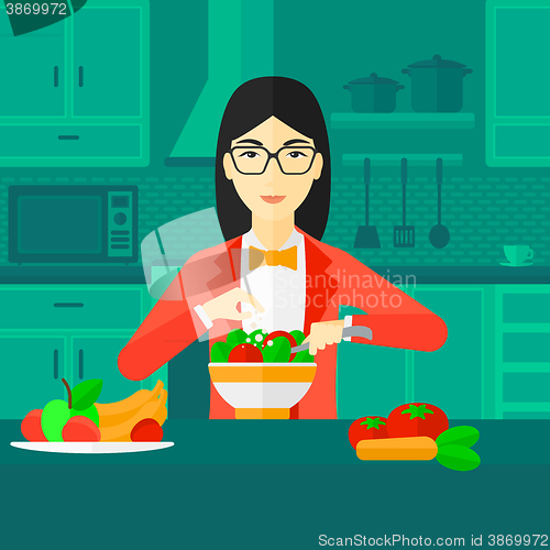 Image of Woman cooking meal.