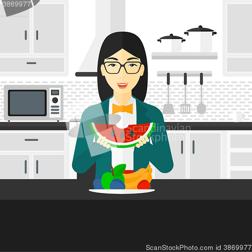 Image of Woman eating watermelon.