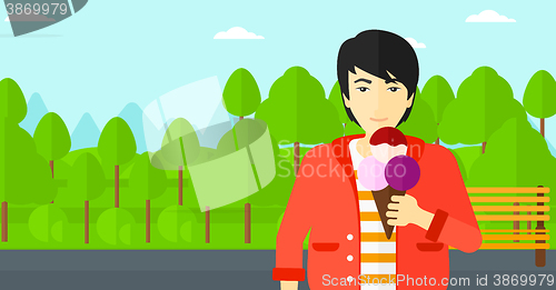 Image of Man holding icecream.