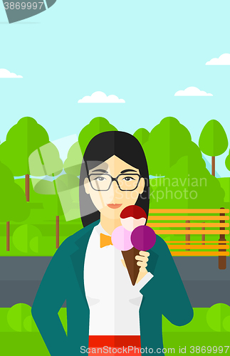 Image of Woman holding icecream.