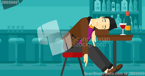 Image of Man sleeping in bar. 