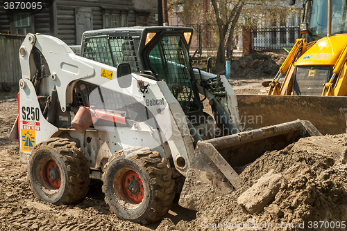 Image of Close up of a bobcat or skid loader