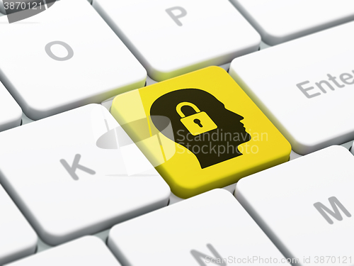 Image of Data concept: Head With Padlock on computer keyboard background