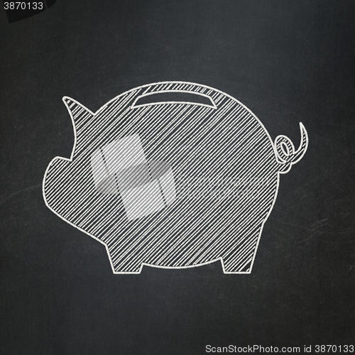 Image of Banking concept: Money Box on chalkboard background