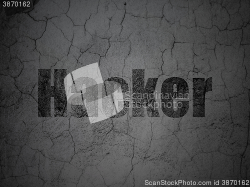 Image of Protection concept: Hacker on grunge wall background