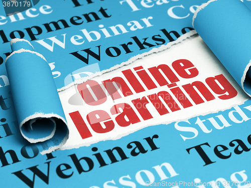 Image of Studying concept: red text Online Learning under the piece of  torn paper