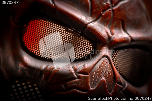 Image of Steel mask covered with rust closeup