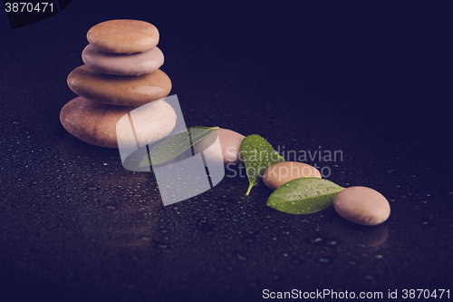 Image of balancing zen stones on black