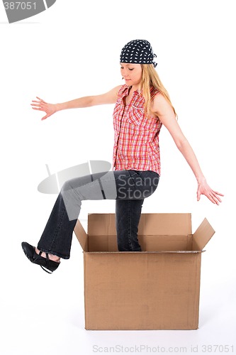 Image of Girl stepping out of the box