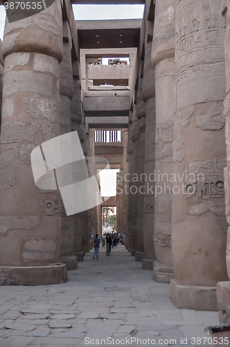 Image of Tourist between Karnak Columns. Luxor, Egypt