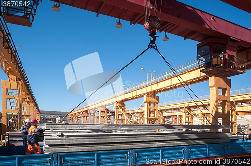 Image of Loading concrete products in onboard car