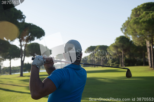 Image of golf player hitting shot