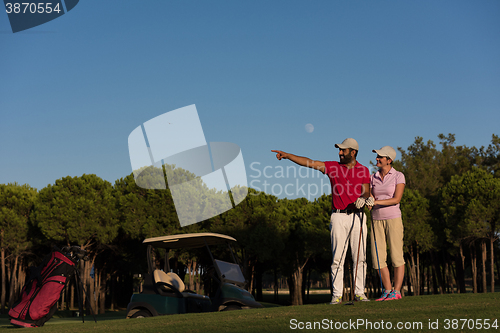 Image of portrait of couple on golf course